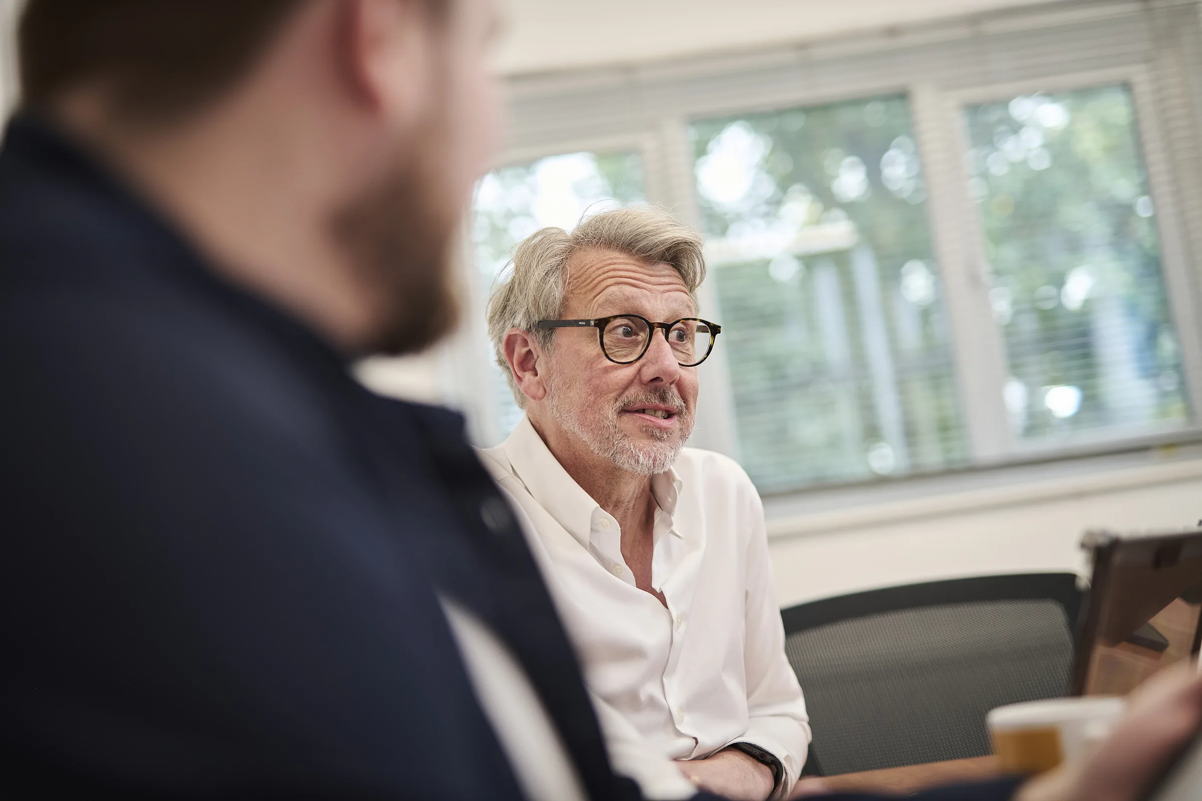 Osiris consultant working through a practical technology plan with a client.
